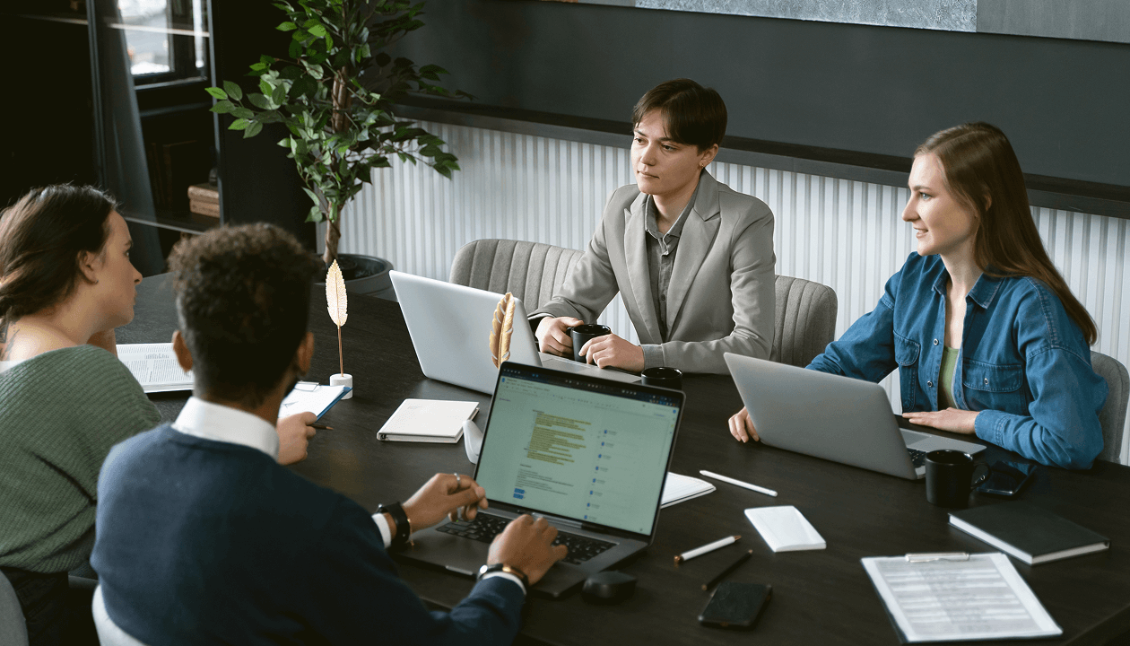 An ongoing business meeting with 4 people